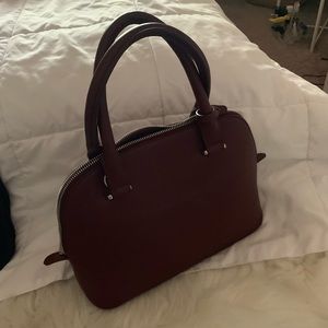small maroon purse